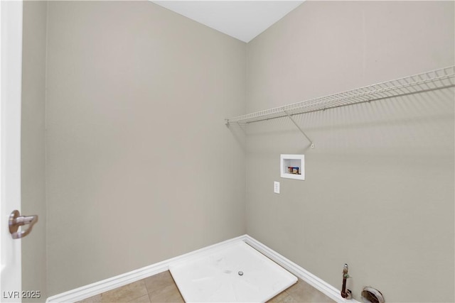 125 Sharp Edge Ave, North Las Vegas, NV 89031 - laundry room with hookup for a washing machine, baseboards, and light tile patterned flooring