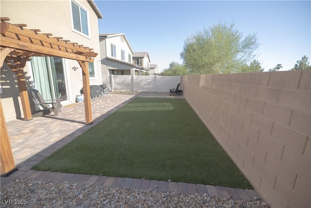 5941 Galway Bay St, North Las Vegas, NV 89081 - fenced backyard with a patio area and a pergola