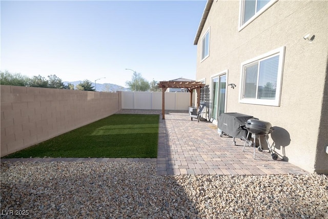 5941 Galway Bay St, North Las Vegas, NV 89081 - fenced backyard featuring a pergola and a patio