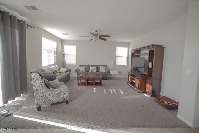 5941 Galway Bay St, North Las Vegas, NV 89081 - carpeted living room featuring ceiling fan and baseboards