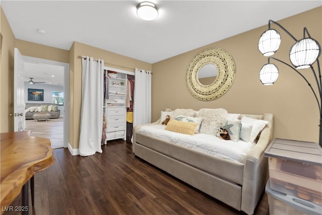 10902 Fintry Hills St, Las Vegas, NV 89141 - bedroom featuring dark wood-style flooring and a closet