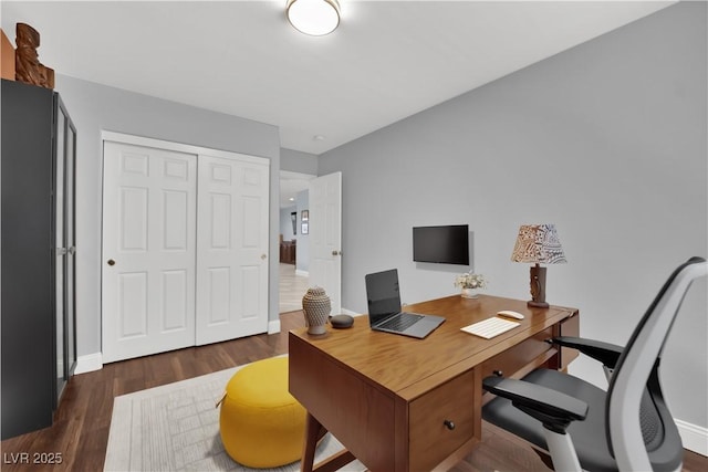 10902 Fintry Hills St, Las Vegas, NV 89141 - home office with dark wood-style floors and baseboards