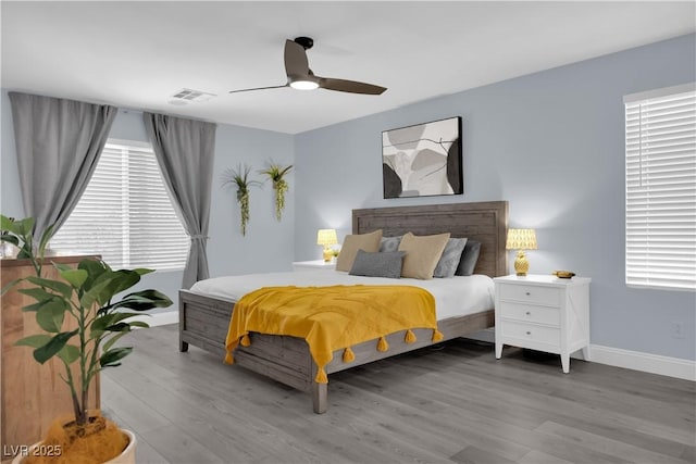 10902 Fintry Hills St, Las Vegas, NV 89141 - bedroom featuring wood finished floors, baseboards, and a ceiling fan