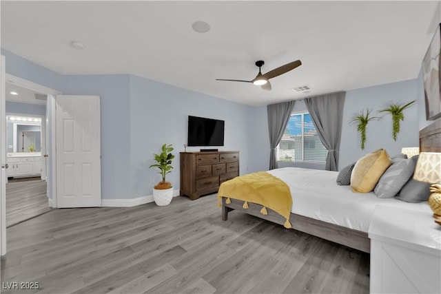 10902 Fintry Hills St, Las Vegas, NV 89141 - bedroom featuring light wood-type flooring, ceiling fan, and baseboards