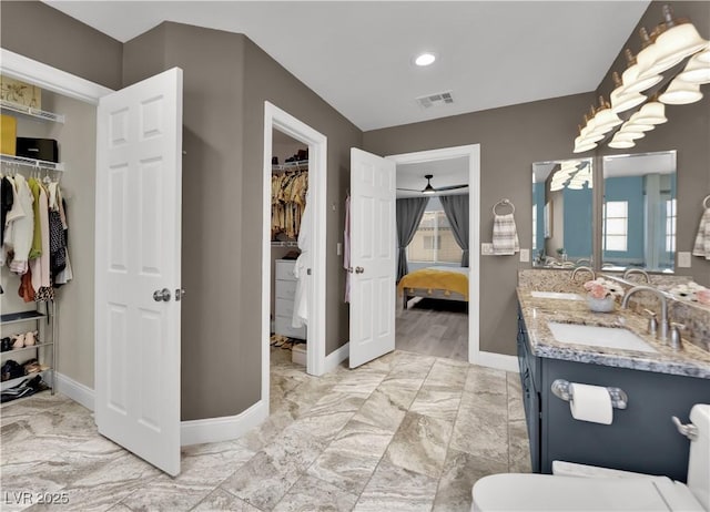 10902 Fintry Hills St, Las Vegas, NV 89141 - bathroom with marble finish flooring, baseboards, double vanity, ensuite bathroom, and recessed lighting