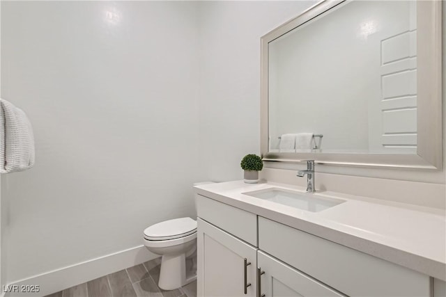 5321 Brayden Ct, Las Vegas, NV 89131 - half bath with vanity, toilet, and baseboards