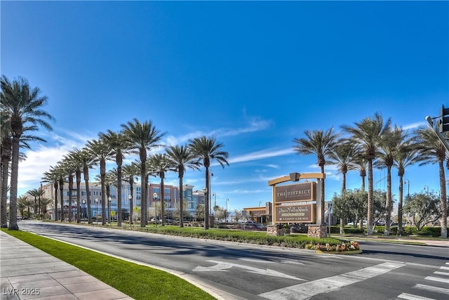 2185 High Mesa Dr, Henderson, NV 89012 - view of asphalt road featuring sidewalks, curbs, and street lighting