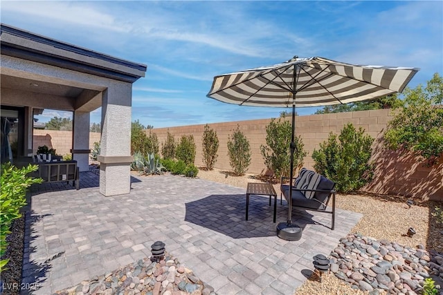 view of patio featuring a fenced backyard