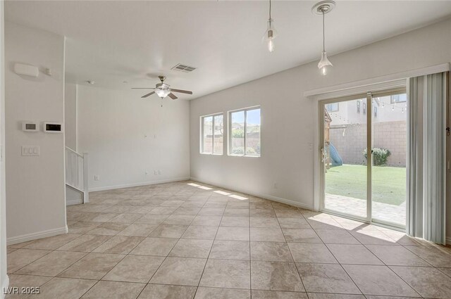 1055 Fish Pond Ave, Henderson, NV 89014 - empty room with a ceiling fan, light tile patterned flooring, and baseboards