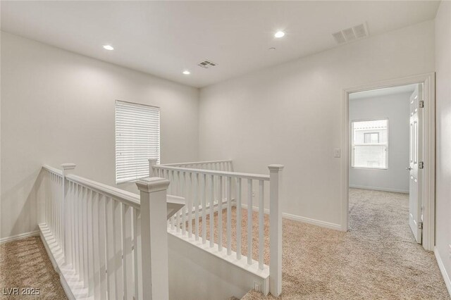1055 Fish Pond Ave, Henderson, NV 89014 - hallway with an upstairs landing, carpet flooring, baseboards, and recessed lighting