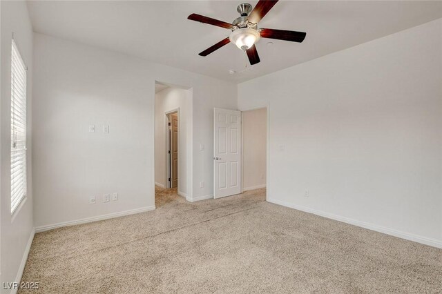 1055 Fish Pond Ave, Henderson, NV 89014 - unfurnished room with carpet flooring, a ceiling fan, and baseboards
