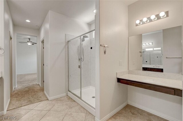 1055 Fish Pond Ave, Henderson, NV 89014 - bathroom featuring a stall shower, tile patterned floors, baseboards, ceiling fan, and recessed lighting