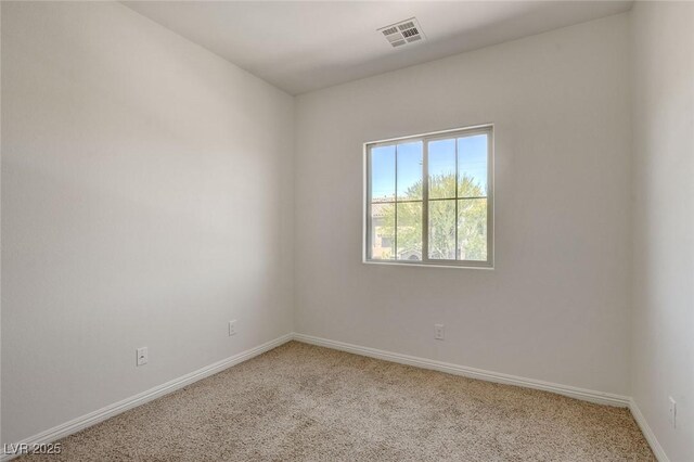 1055 Fish Pond Ave, Henderson, NV 89014 - unfurnished room with light carpet and baseboards