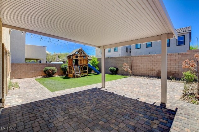 1055 Fish Pond Ave, Henderson, NV 89014 - view of patio / terrace featuring a playground