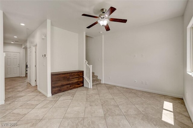 1055 Fish Pond Ave, Henderson, NV 89014 - unfurnished room featuring recessed lighting, stairs, a ceiling fan, light tile patterned flooring, and baseboards