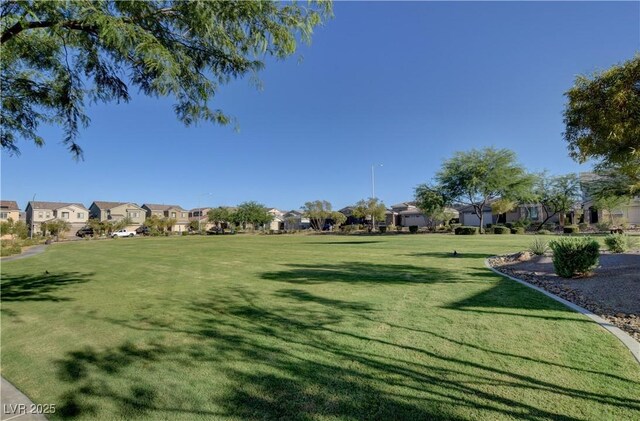 1055 Fish Pond Ave, Henderson, NV 89014 - view of community featuring a residential view and a yard
