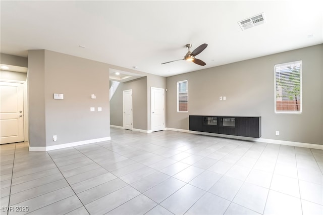 5981 Smith Valley Rd, Las Vegas, NV 89148 - tiled empty room featuring a ceiling fan and baseboards