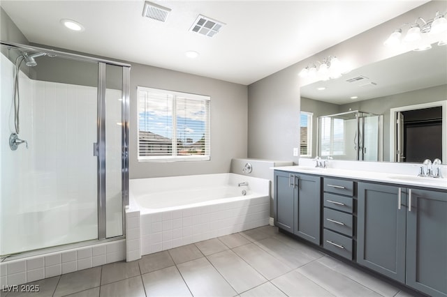 5981 Smith Valley Rd, Las Vegas, NV 89148 - bathroom with a stall shower, a bath, double vanity, tile patterned flooring, and recessed lighting