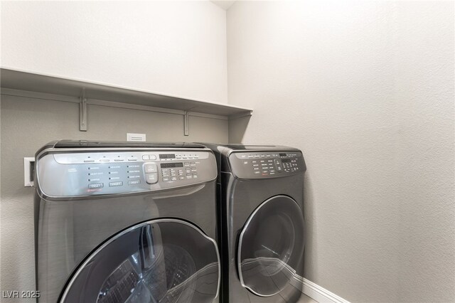 5981 Smith Valley Rd, Las Vegas, NV 89148 - clothes washing area with independent washer and dryer and baseboards