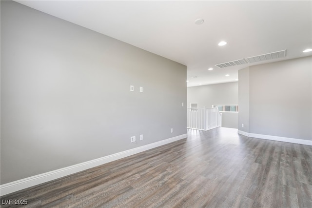 5981 Smith Valley Rd, Las Vegas, NV 89148 - empty room with wood finished floors, recessed lighting, and baseboards