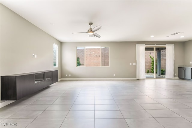 5981 Smith Valley Rd, Las Vegas, NV 89148 - unfurnished living room with ceiling fan, light tile patterned floors, baseboards, and recessed lighting