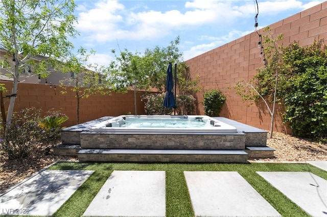 5981 Smith Valley Rd, Las Vegas, NV 89148 - fenced backyard with an outdoor hot tub