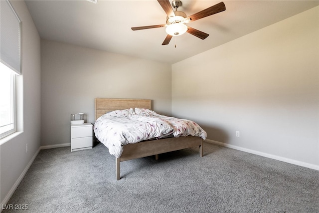 bedroom with carpet flooring, baseboards, and ceiling fan