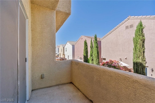 balcony featuring a residential view
