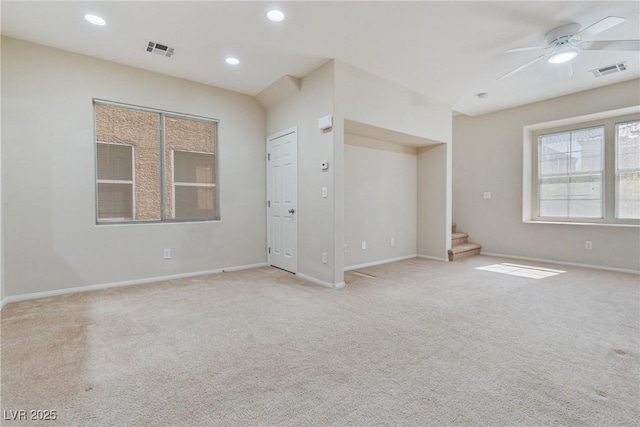 unfurnished room with stairs, ceiling fan, carpet flooring, baseboards, and recessed lighting