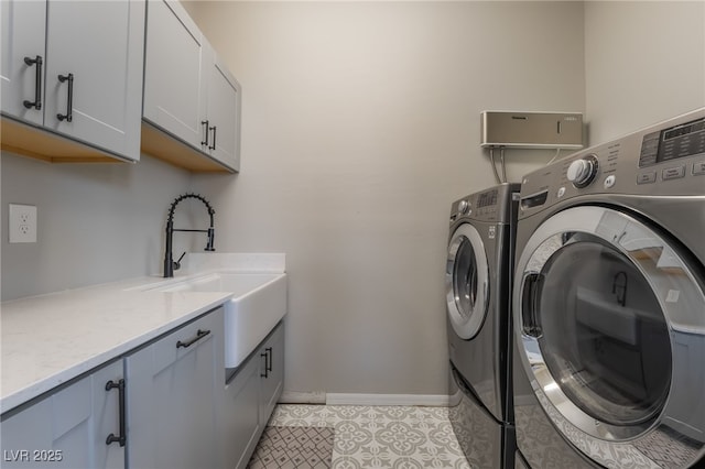 133 Clouded Ave, Henderson, NV 89002 - laundry room featuring cabinet space, independent washer and dryer, and baseboards