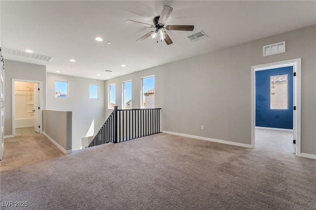 133 Clouded Ave, Henderson, NV 89002 - unfurnished room with light colored carpet, baseboards, ceiling fan, and recessed lighting