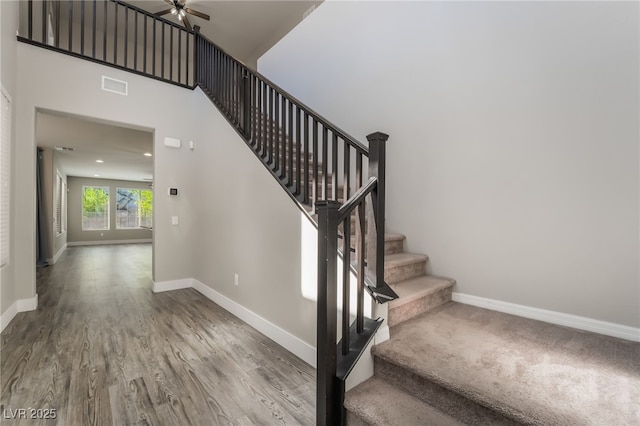 133 Clouded Ave, Henderson, NV 89002 - staircase with baseboards, wood finished floors, and ceiling fan