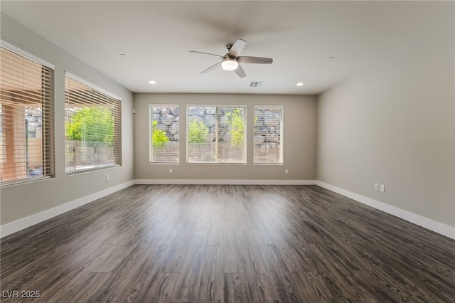 133 Clouded Ave, Henderson, NV 89002 - empty room with a ceiling fan, healthy amount of natural light, dark wood finished floors, baseboards, and recessed lighting
