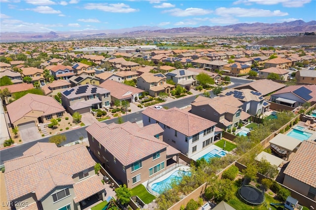 133 Clouded Ave, Henderson, NV 89002 - aerial perspective of suburban area featuring a pool and a mountain backdrop
