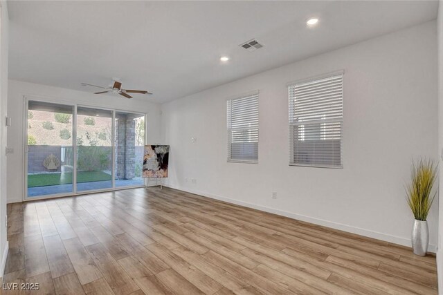 40 Strada Moscato, Henderson, NV 89011 - unfurnished living room featuring a ceiling fan, light wood finished floors, baseboards, and recessed lighting