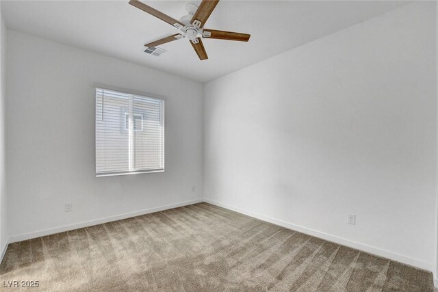 40 Strada Moscato, Henderson, NV 89011 - spare room with carpet flooring, a ceiling fan, and baseboards