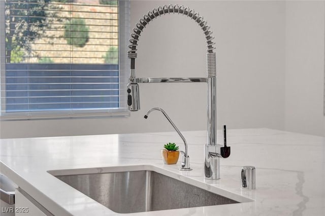 40 Strada Moscato, Henderson, NV 89011 - kitchen view of a sink and light stone counters