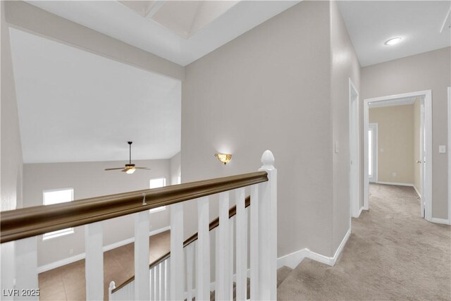 2257 Norway Pine Ct, Las Vegas, NV 89134 - hallway with an upstairs landing, light carpet, and baseboards