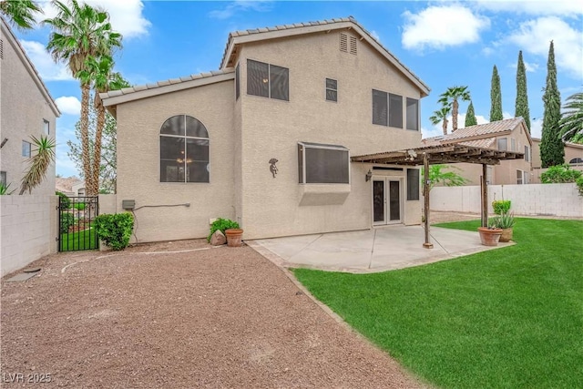 2257 Norway Pine Ct, Las Vegas, NV 89134 - rear view of house featuring a pergola, stucco siding, a gate, a patio area, and a tiled roof