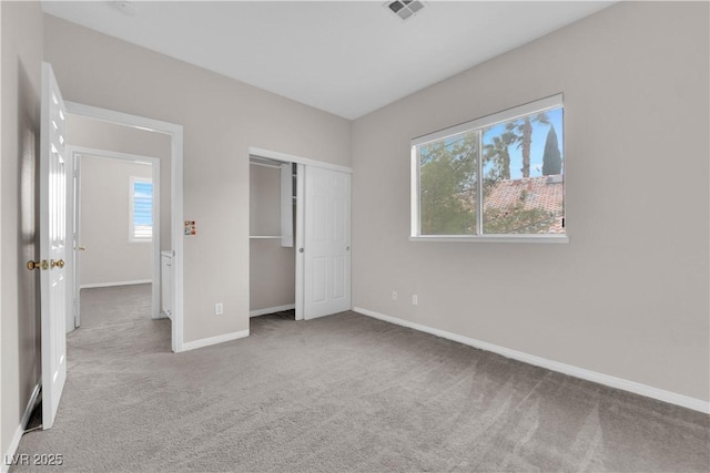 2257 Norway Pine Ct, Las Vegas, NV 89134 - unfurnished bedroom with carpet floors, multiple windows, and baseboards