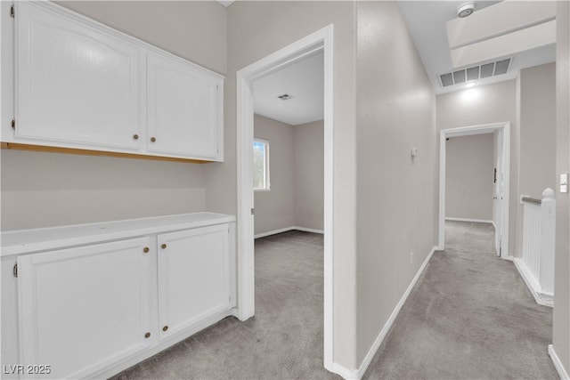 2257 Norway Pine Ct, Las Vegas, NV 89134 - corridor with light colored carpet and baseboards