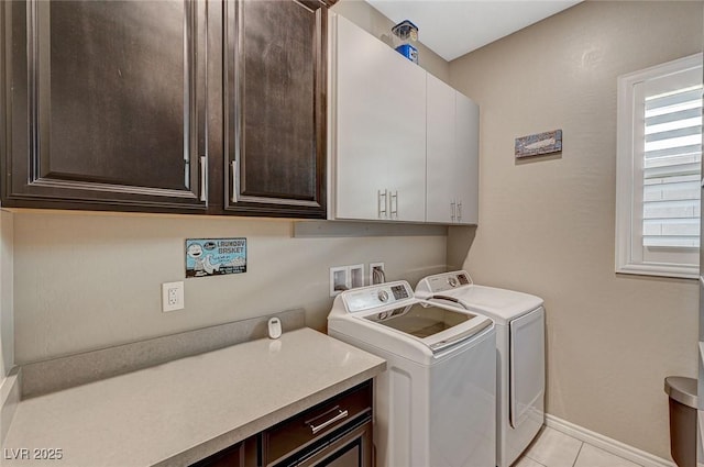 468 Harvest Rain, Las Vegas, NV 89011 - washroom featuring cabinet space, separate washer and dryer, light tile patterned flooring, and baseboards