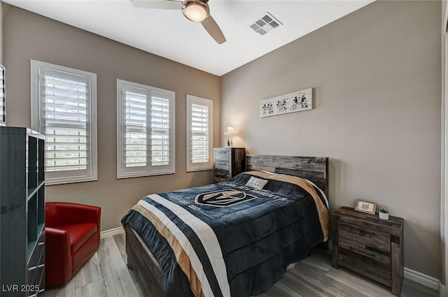 468 Harvest Rain, Las Vegas, NV 89011 - bedroom featuring multiple windows, baseboards, wood finished floors, and ceiling fan