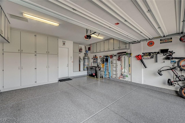 468 Harvest Rain, Las Vegas, NV 89011 - garage with water heater and a garage door opener
