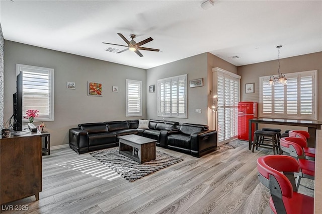 468 Harvest Rain, Las Vegas, NV 89011 - living area with light wood-style floors, ceiling fan, and healthy amount of natural light