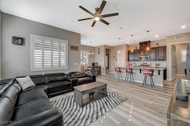 468 Harvest Rain, Las Vegas, NV 89011 - living room featuring ceiling fan, light wood-style flooring, plenty of natural light, and recessed lighting