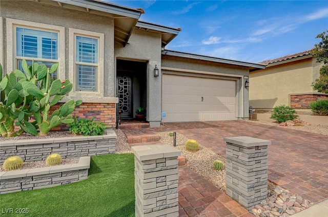 468 Harvest Rain, Las Vegas, NV 89011 - view of front of home with decorative driveway, stucco siding, and an attached garage