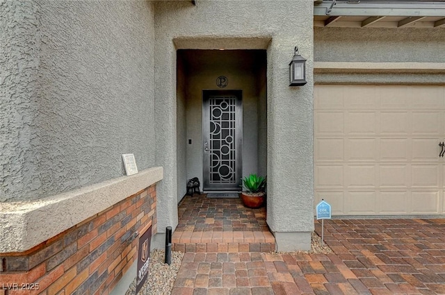 468 Harvest Rain, Las Vegas, NV 89011 - view of exterior entry featuring stucco siding and a garage