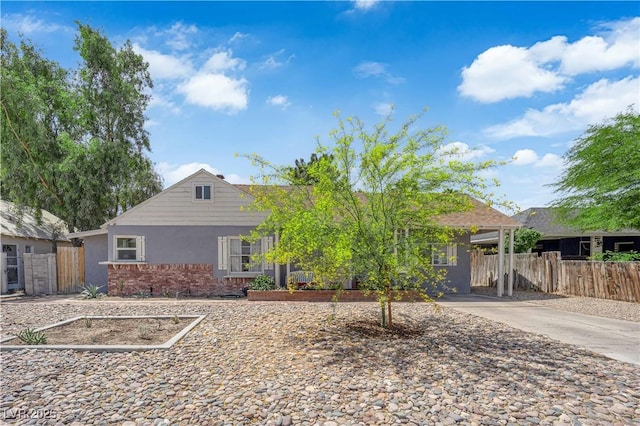 1320 Wengert Ave, Las Vegas, NV 89104 - view of front facade with fence and stucco siding