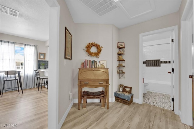 1320 Wengert Ave, Las Vegas, NV 89104 - hall featuring light wood-style flooring and baseboards